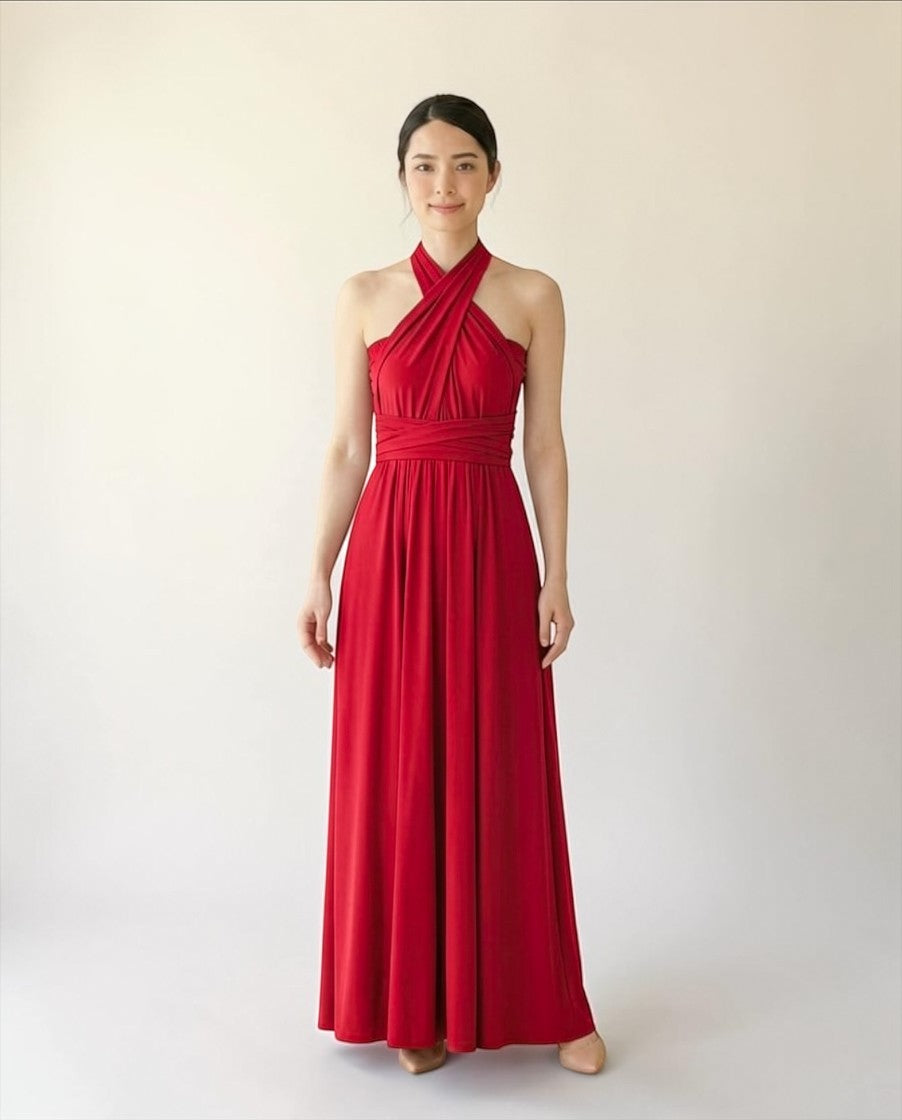 BridesmaidsJP red infinity dress with halter neck and flowing skirt, versatile for various occasions.