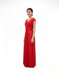 BridesmaidsJP red infinity dress with a V-neckline and cap sleeves, made of jersey material, shown on a model against a white background.