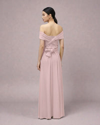 BridesmaidsJP smokey pink infinity dress with off-the-shoulder neckline and tie waist, worn by a model.
