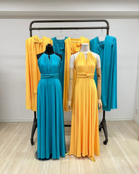 BridesmaidsJP turquoise and orange infinity dresses on mannequins and hangers. Long, flowing, versatile jersey dresses.